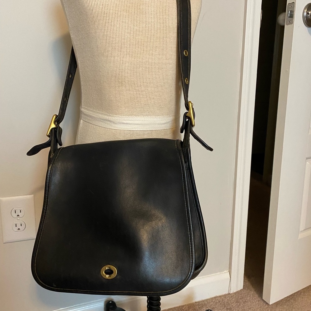Vintage 1970’s black leather coach saddle messenger bag